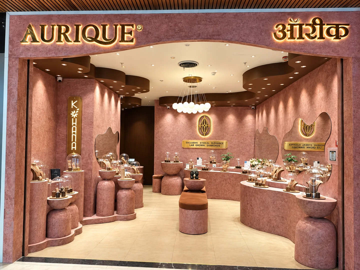 Aurique storefront with sculptural terracotta counters and glass jewellery displays